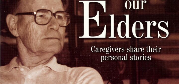 Book cover showing the title and subtitle of Minding Our Elders: Caregivers Share Their Personal Stories. The background is a room showing little detail but is toned a rich brown. The foreground is an older man in a light shirt, wearing dark rimmed glasses. He has his arms folded across his chest in a relaxed manner.