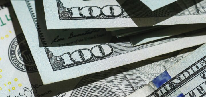 A spread out mass of $100 bills
