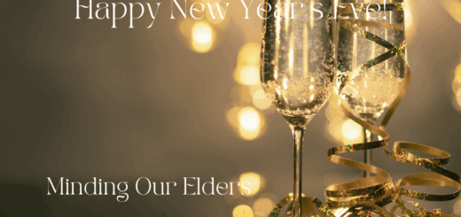 We see a god background with blurred gold holiday lights. On the right we see two champaign glasses, while on the right we see the words Happy New Year and Minding Our Elders